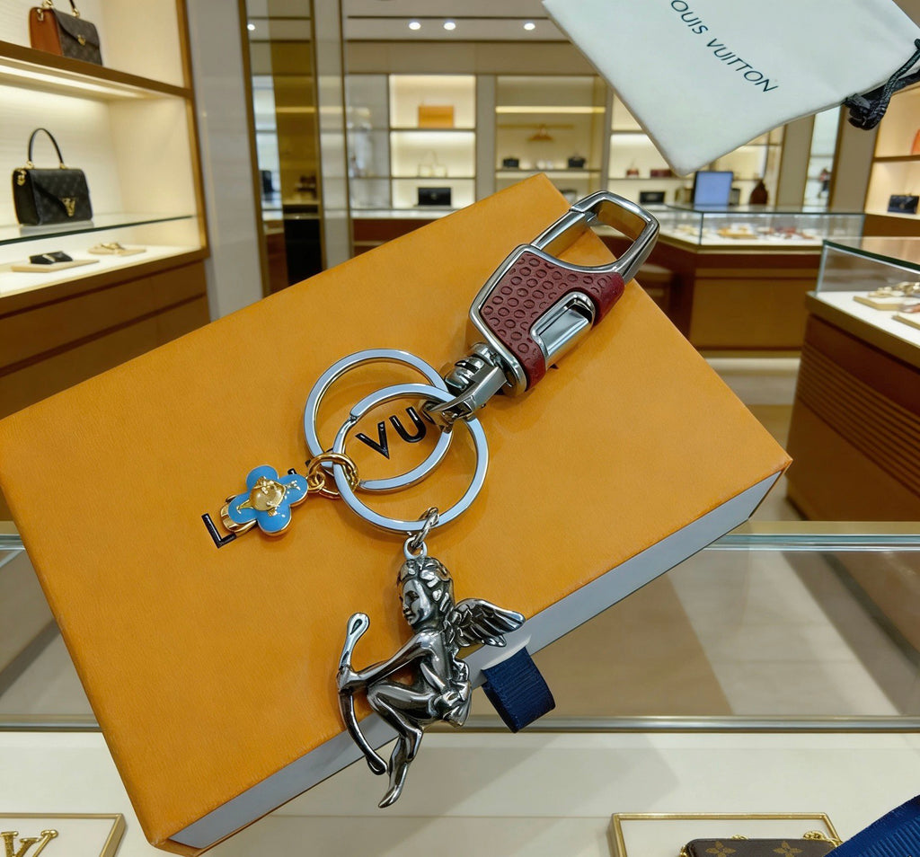 Louis Vuitton Silver-Tone Character Keychain with Flower Charms - album image 4