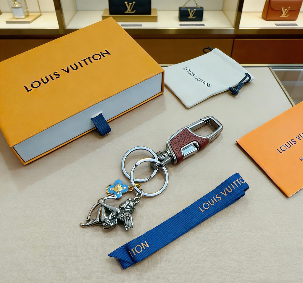 Louis Vuitton Silver-Tone Character Keychain with Flower Charms - album image 1