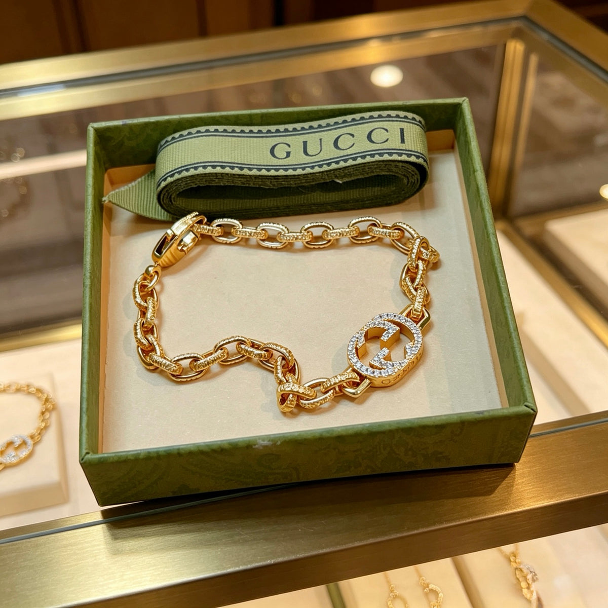 Gucci Gold-Tone Oval Link Bracelet with Crystal Detail - album image 5
