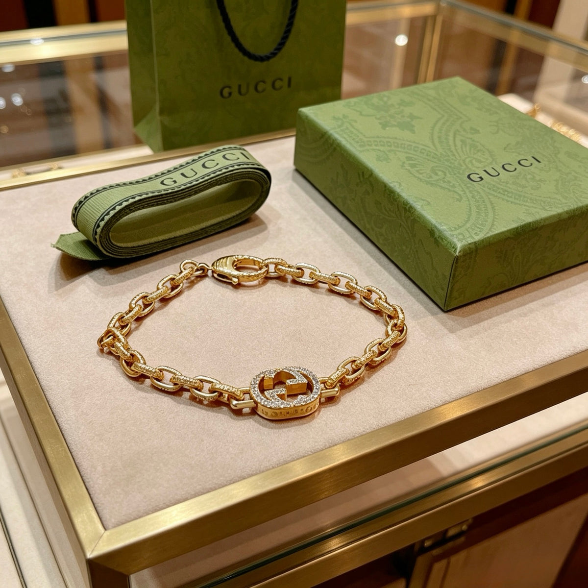 Gucci Gold-Tone Oval Link Bracelet with Crystal Detail - album image 7