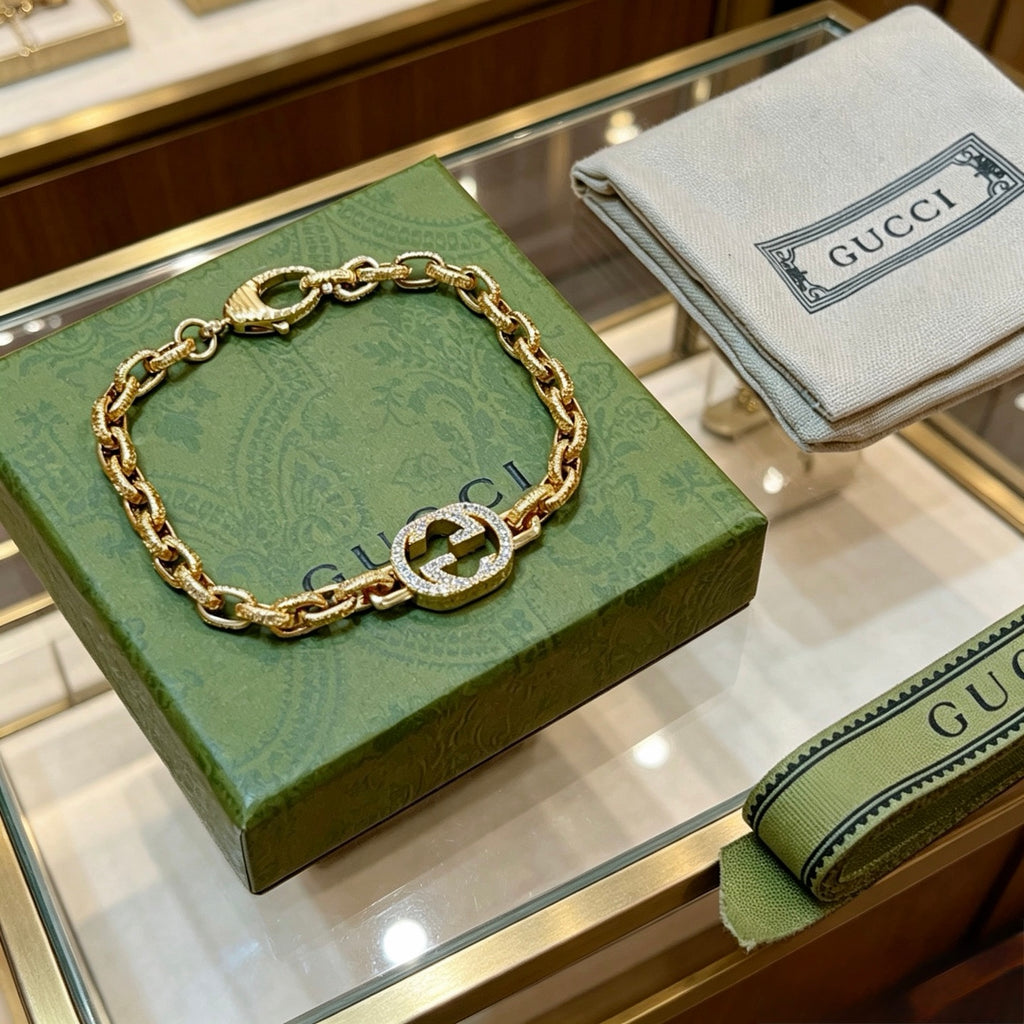Gucci Gold-Tone Oval Link Bracelet with Crystal Detail - album image 6