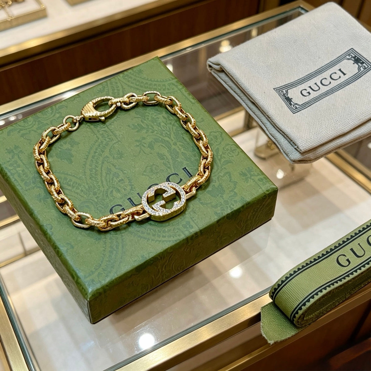 Gucci Gold-Tone Oval Link Bracelet with Crystal Detail - album image 6