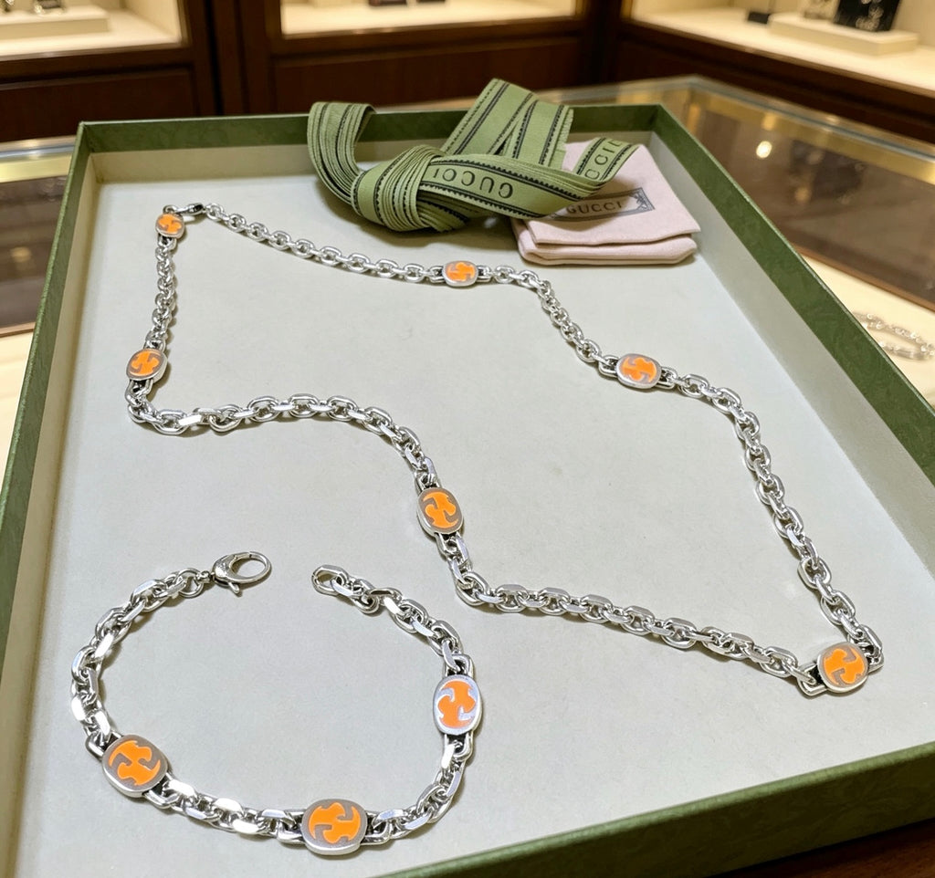 Gucci Silver-Tone Orange Enamel Jewelry Options - album image 3