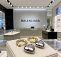 Balenciaga Gold-Tone Hoop Earrings with Silver-Tone Hearts - album image 1