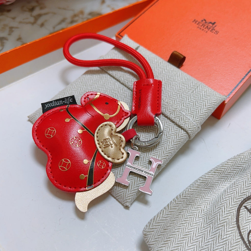 Hermès Red Flower-Charm Keychain with Red Braided Cord - album image 6