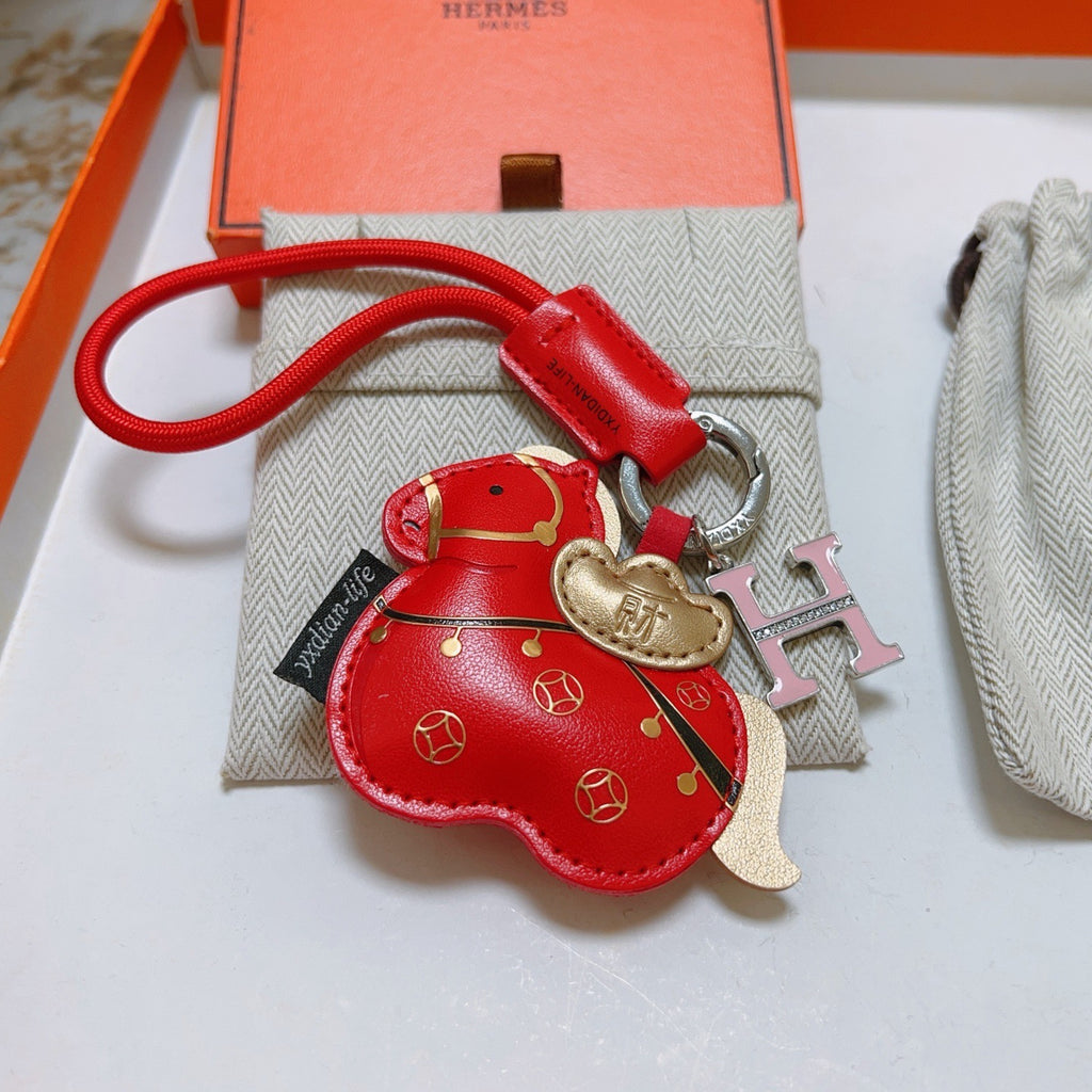 Hermès Red Flower-Charm Keychain with Red Braided Cord - album image 3