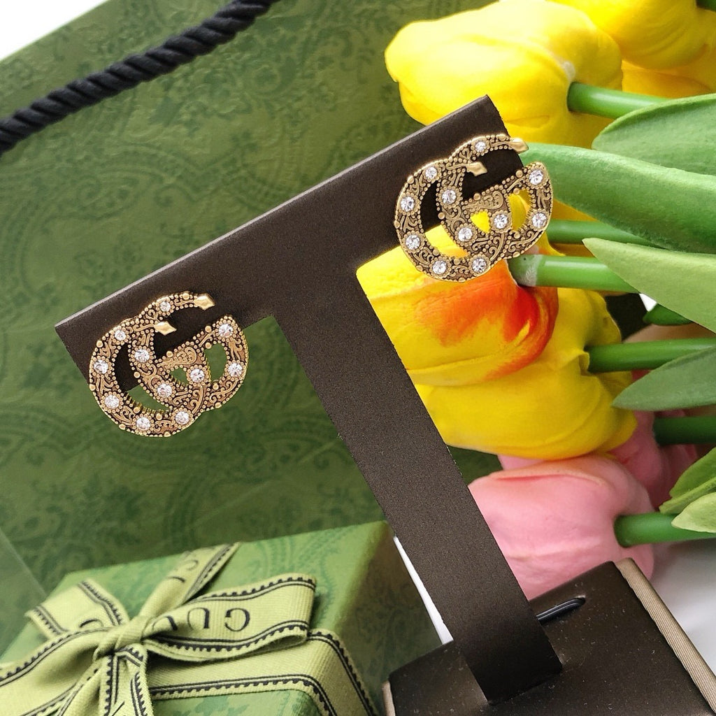 Gucci Interlocking G Gold-Tone Twisted Crystal Accent Earrings - album image 6
