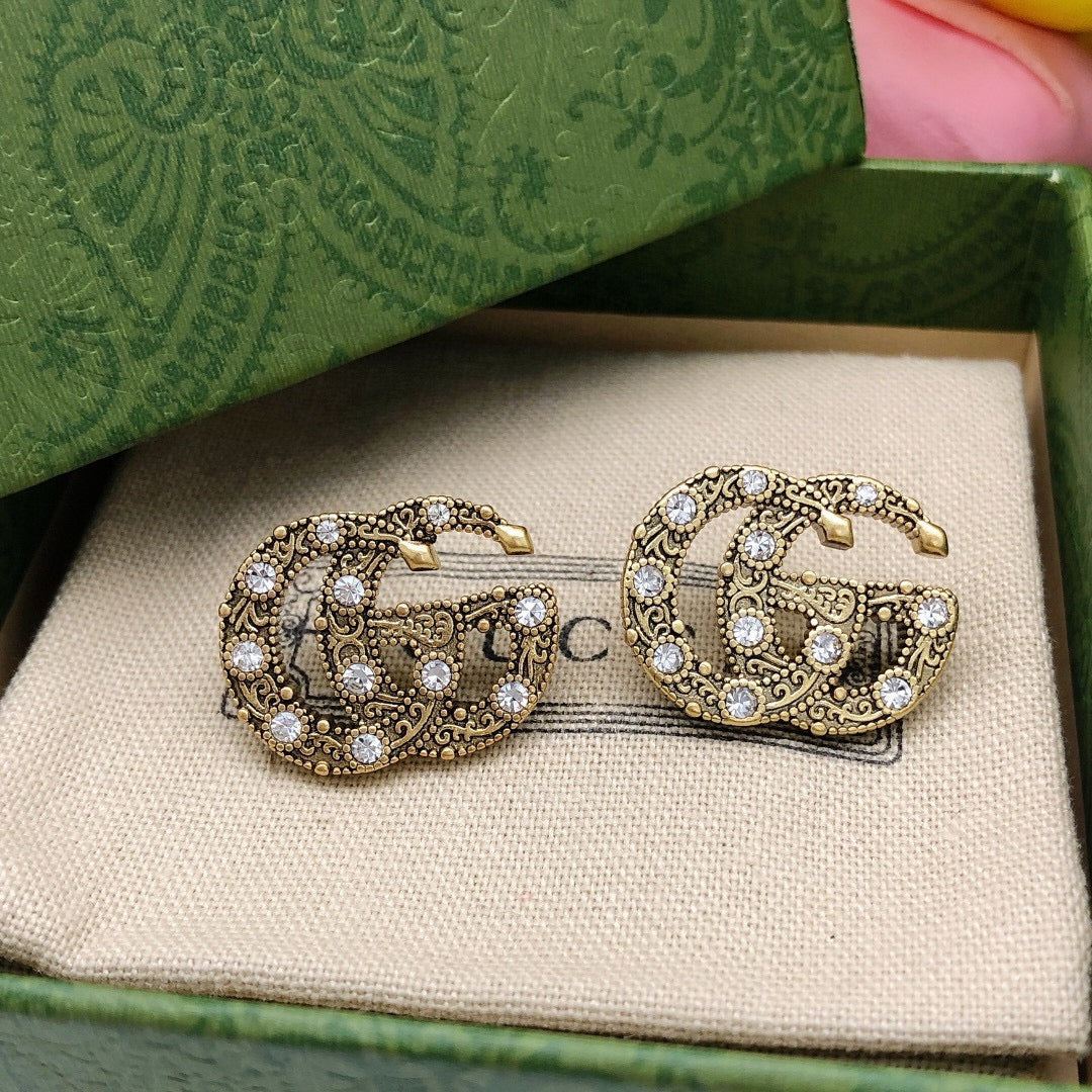 Gucci Interlocking G Gold-Tone Twisted Crystal Accent Earrings - album image 2