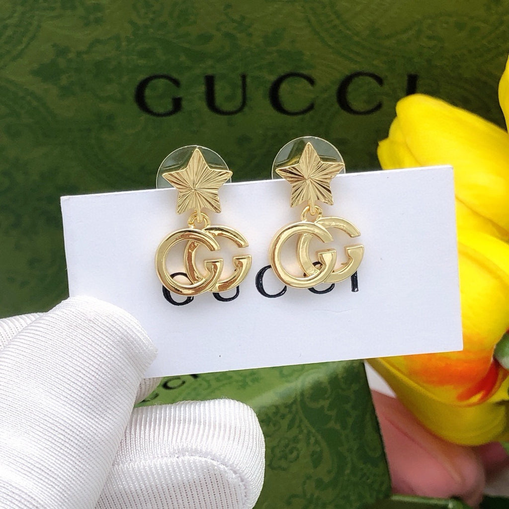 Gucci Interlocking G Star Polished Earrings - album image 1