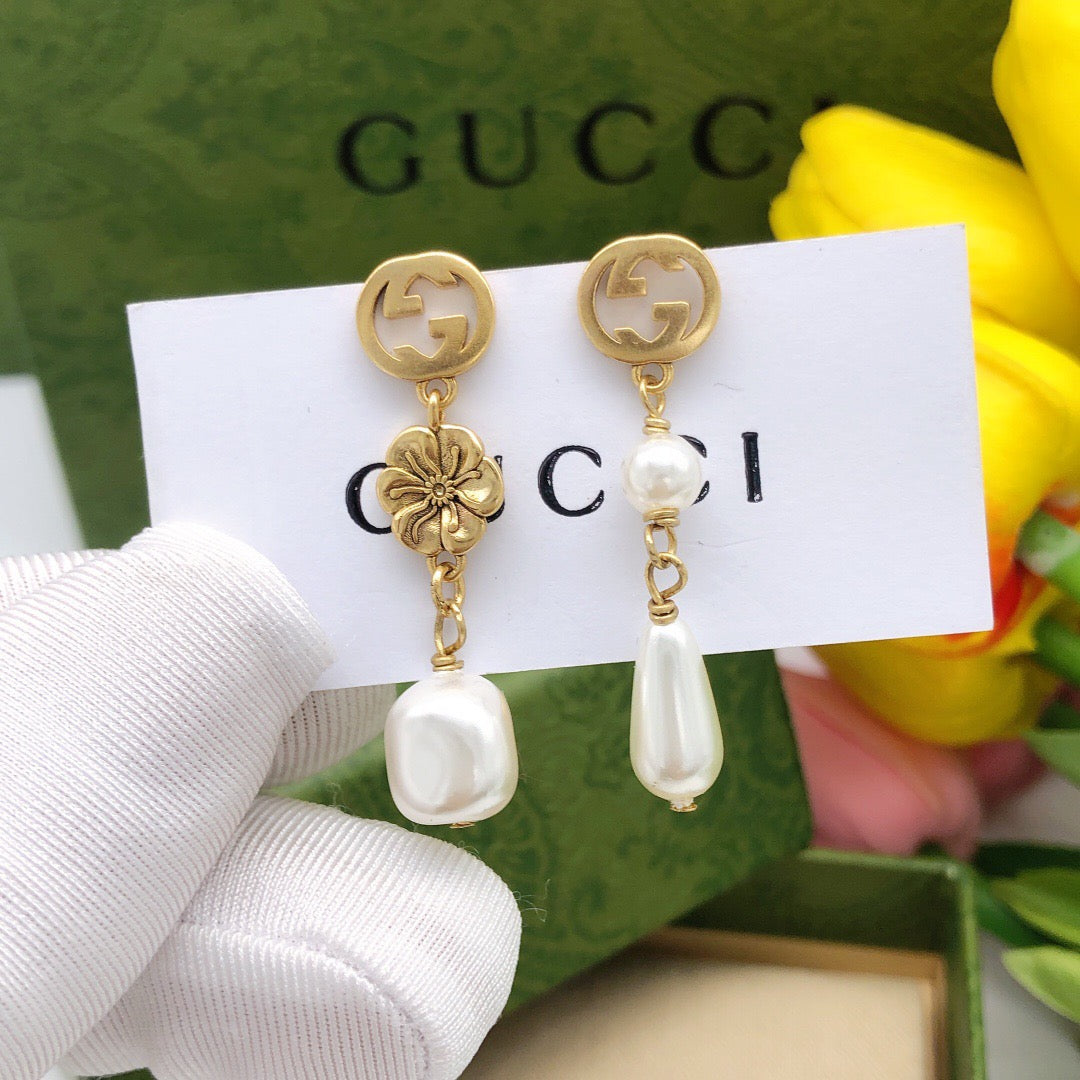 Gucci Teardrop Pearl Flower Earrings - album image 1
