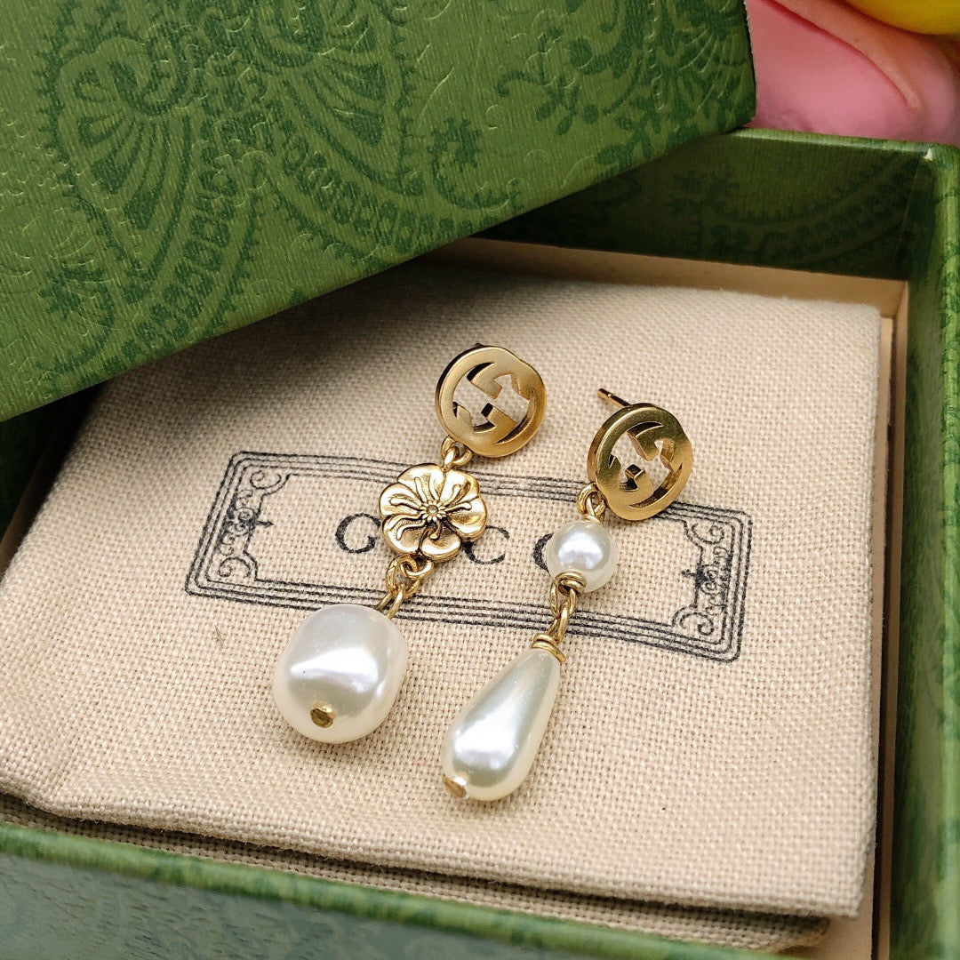 Gucci Teardrop Pearl Flower Earrings - album image 6