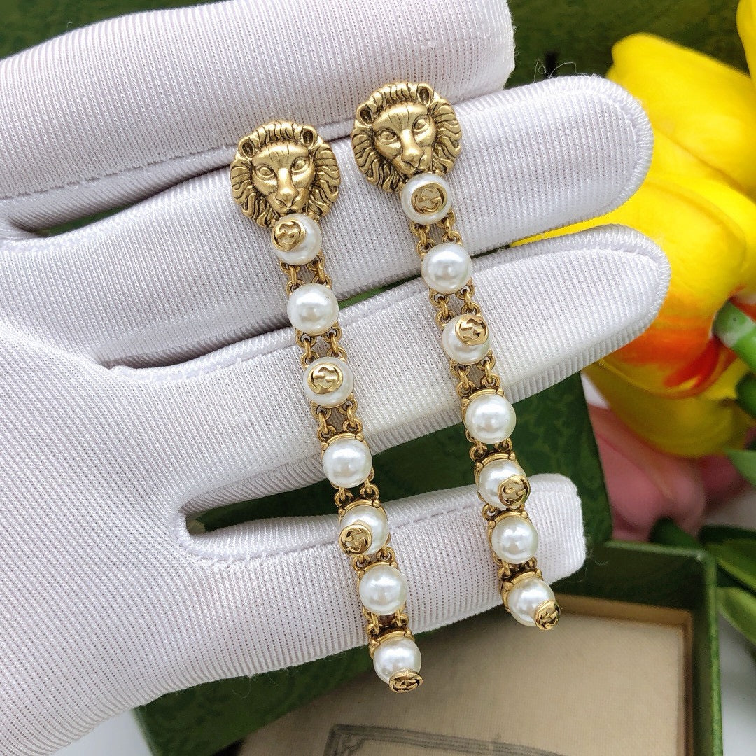 Gucci Lion Head Tassel Earrings - album image 2