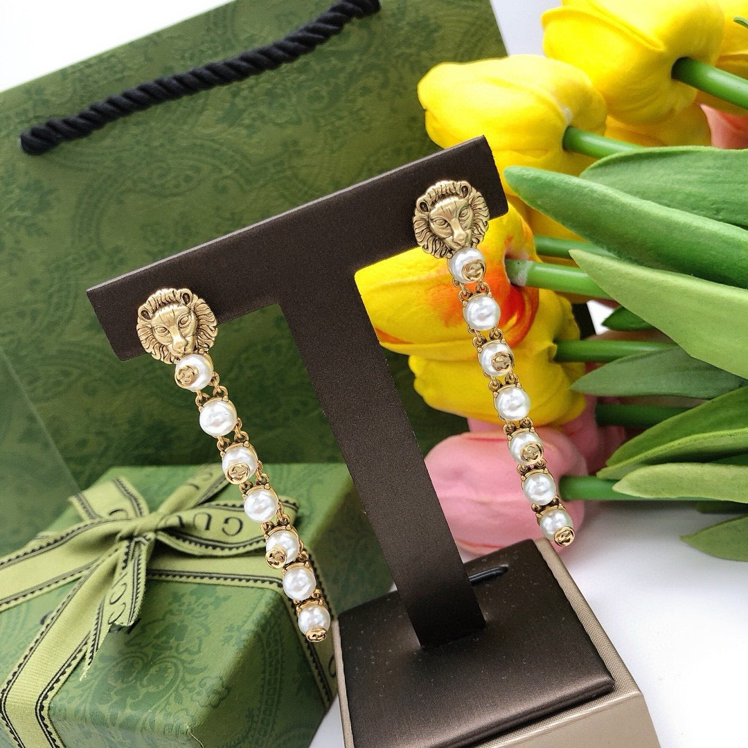 Gucci Lion Head Tassel Earrings - album image 4