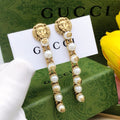Gucci Lion Head Tassel Earrings - album image 1