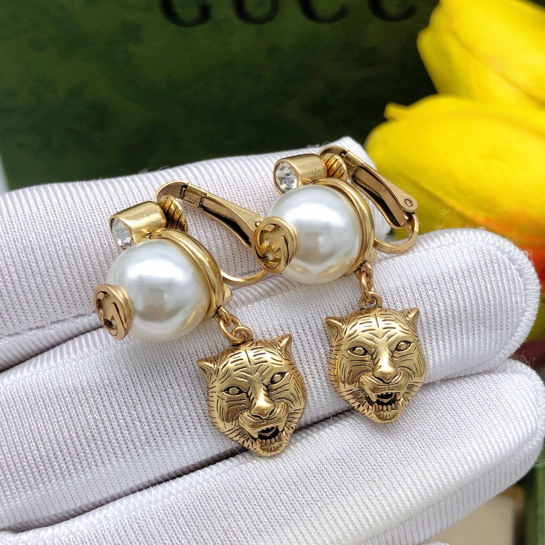 Gucci Tiger Head Earrings - album image 1