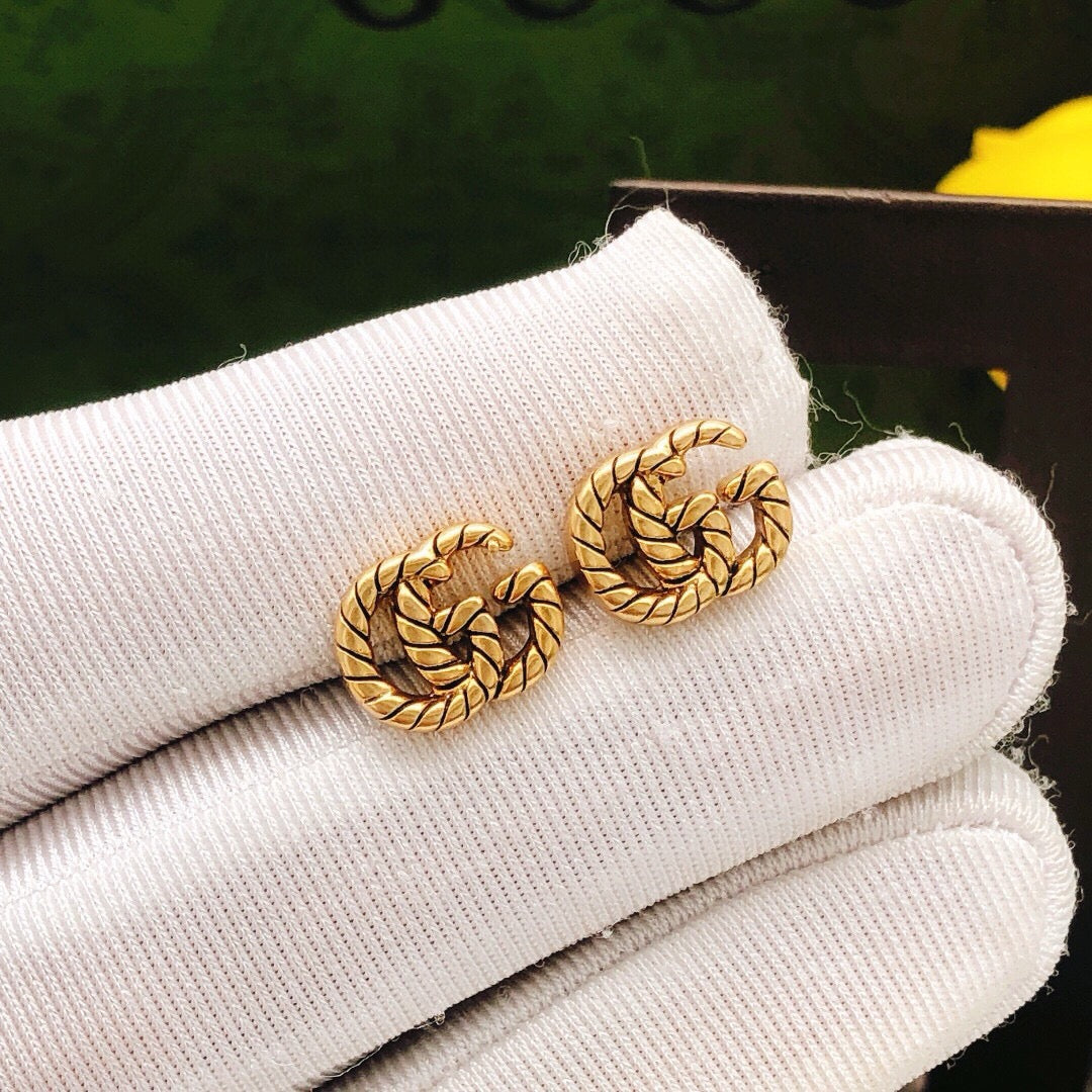 Gucci Interlocking G Twisted Mini Earrings - album image 8