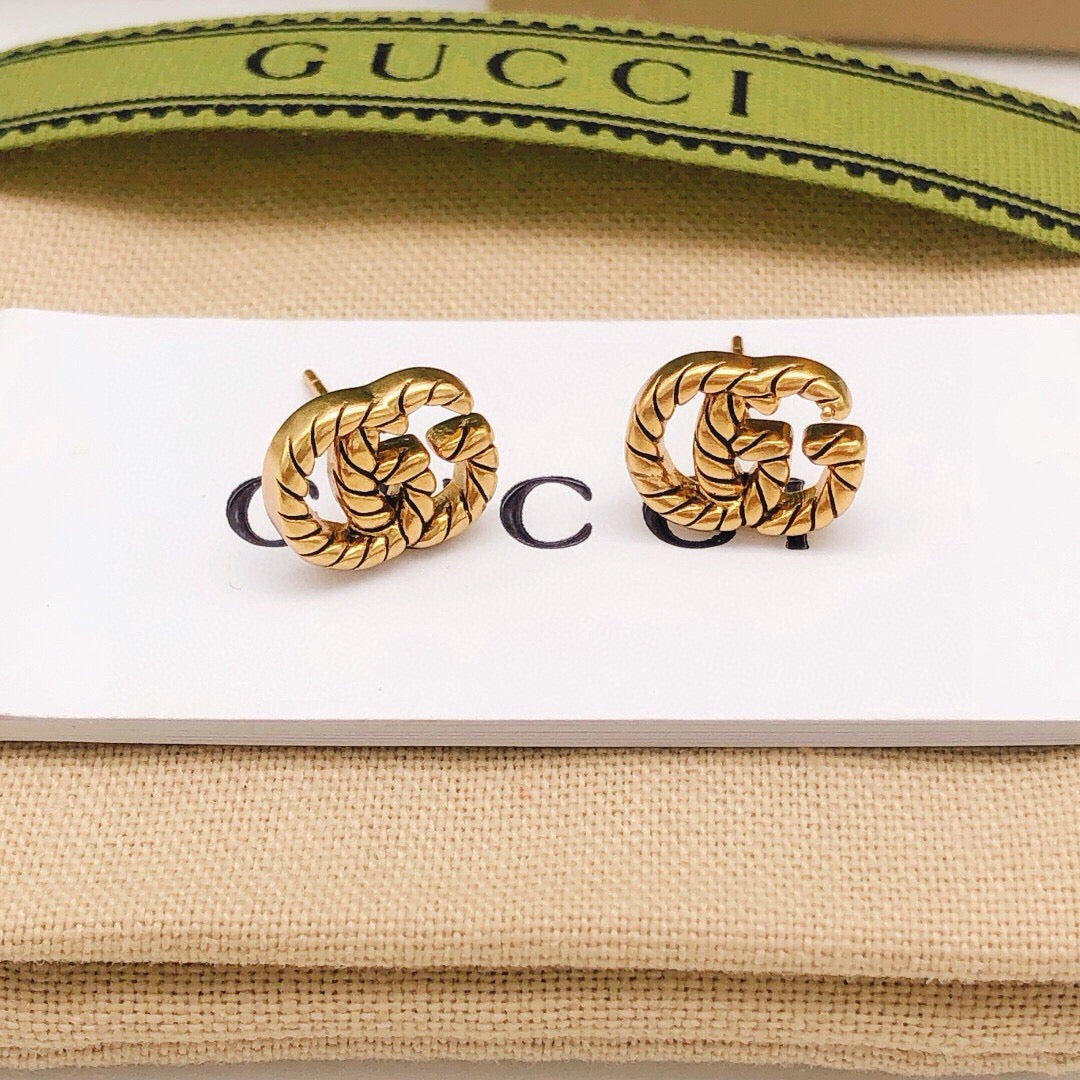 Gucci Interlocking G Twisted Mini Earrings - album image 3