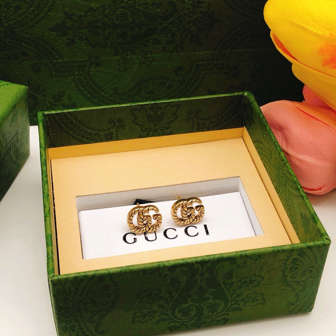 Gucci Interlocking G Twisted Mini Earrings - album image 5