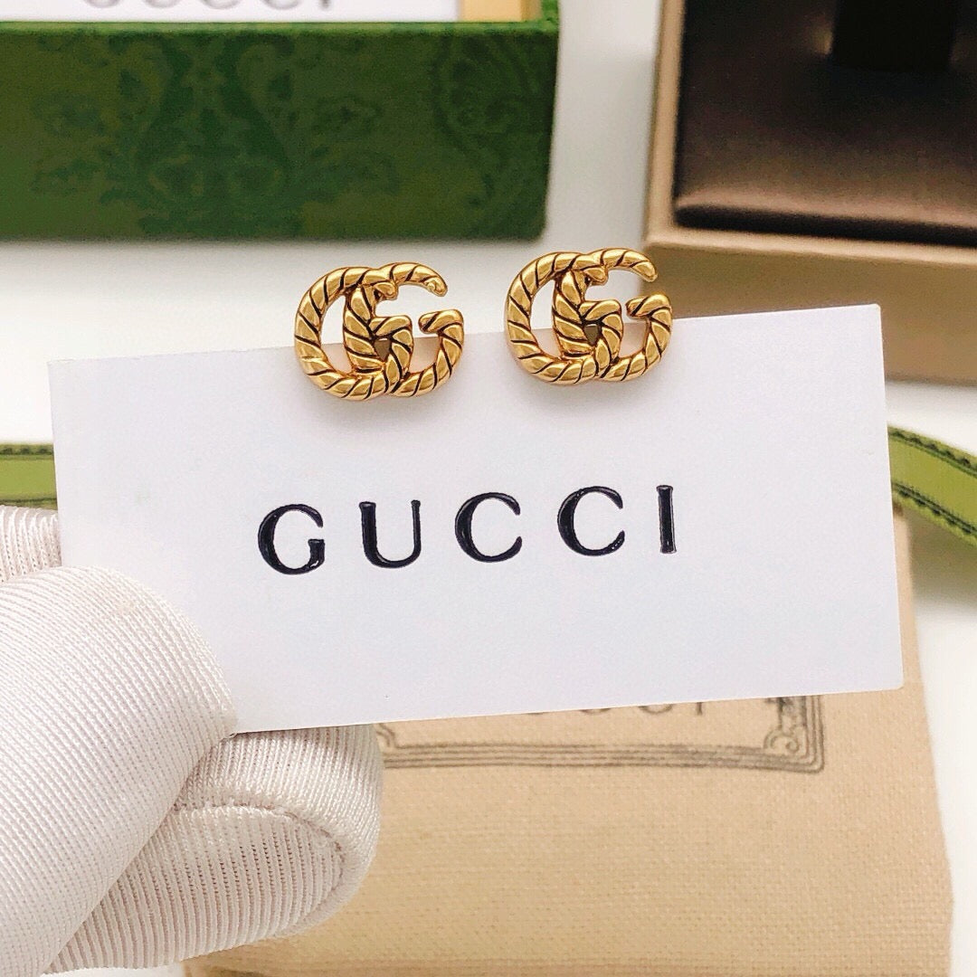 Gucci Interlocking G Twisted Mini Earrings - album image 7