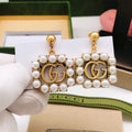 Gucci Pearl Tassel Earrings - album image 1