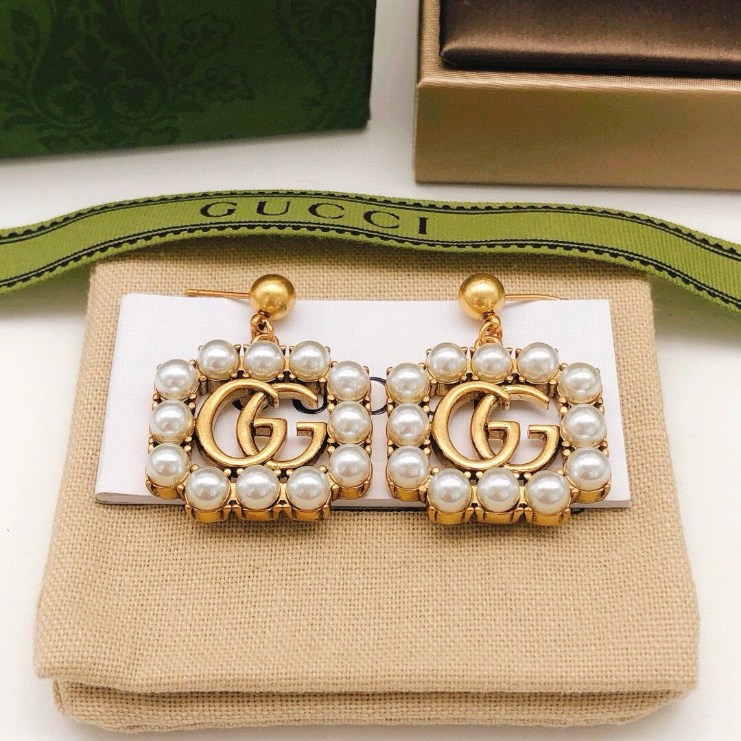 Gucci Pearl Tassel Earrings - album image 2