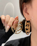 Louis Vuitton LV Letter Stud Earrings - album image 1