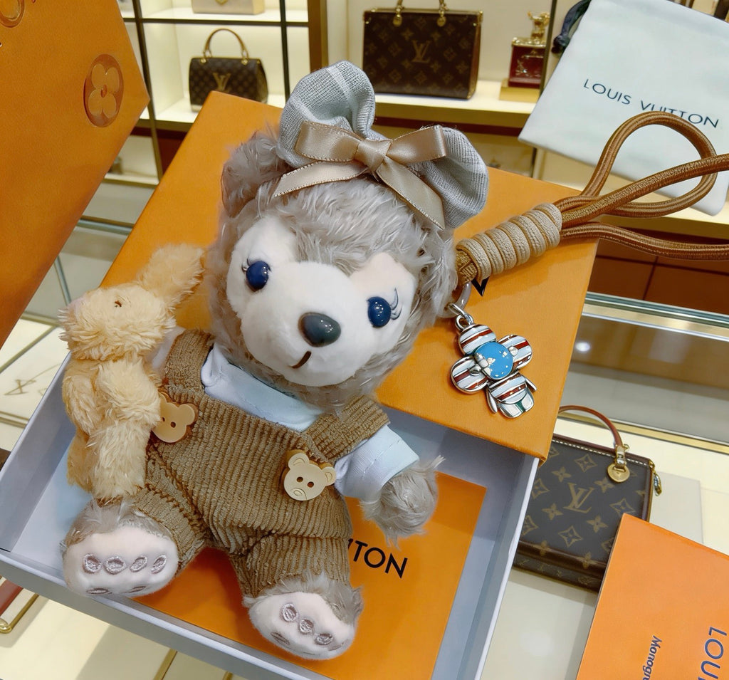 Louis Vuitton Gray Plush Character Keychain in Tan Outfit - album image 6