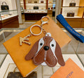 Louis Vuitton Brown Dog Keychain with Long Ears - album image 1