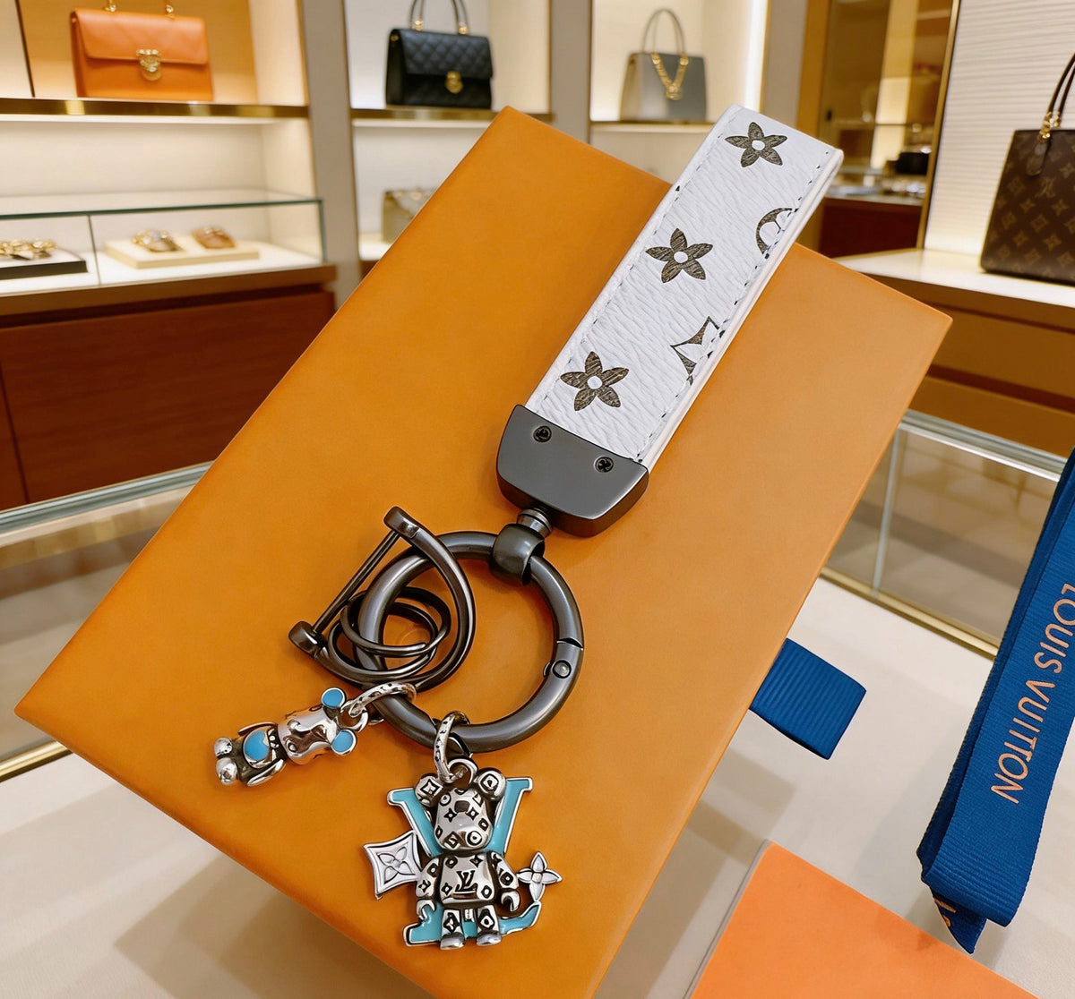 Louis Vuitton White Strap Keychain with Monogram Pendants - album image 2
