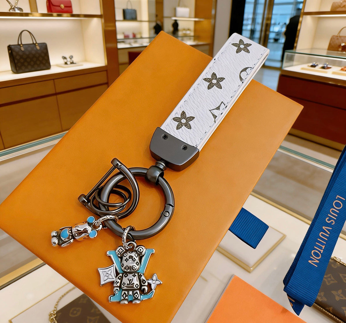 Louis Vuitton White Strap Keychain with Monogram Pendants - album image 4