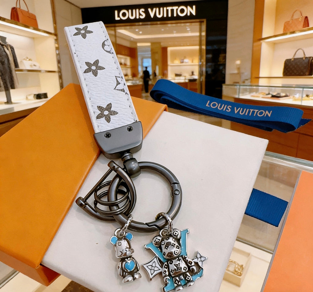 Louis Vuitton White Strap Keychain with Monogram Pendants - album image 6