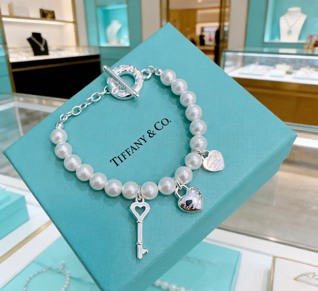 Tiffany & Co. Star and Charm Bead Bracelet - album image 8