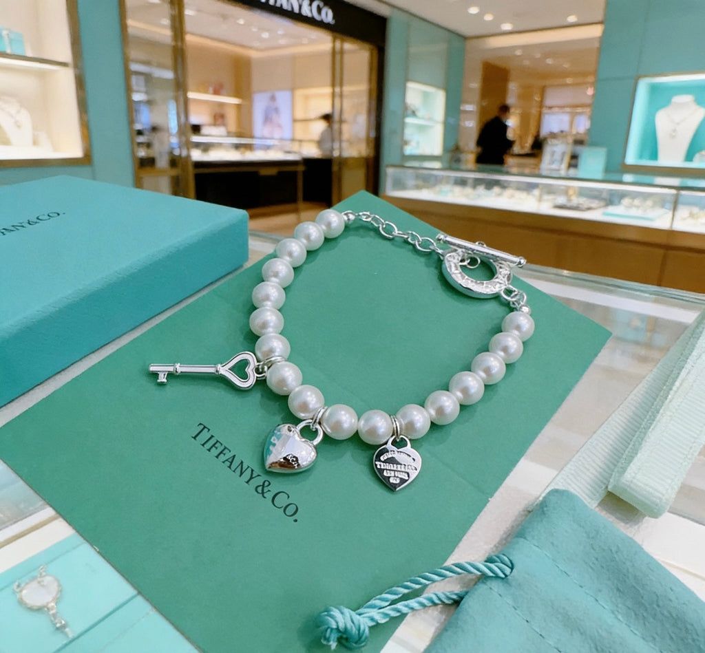 Tiffany & Co. Star and Charm Bead Bracelet - album image 1