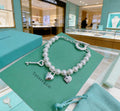 Tiffany & Co. Star and Charm Bead Bracelet - album image 1