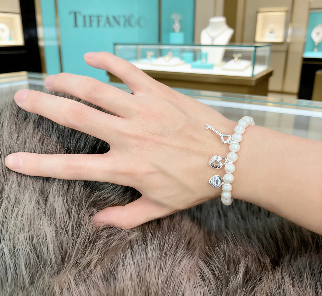 Tiffany & Co. Star and Charm Bead Bracelet - album image 7