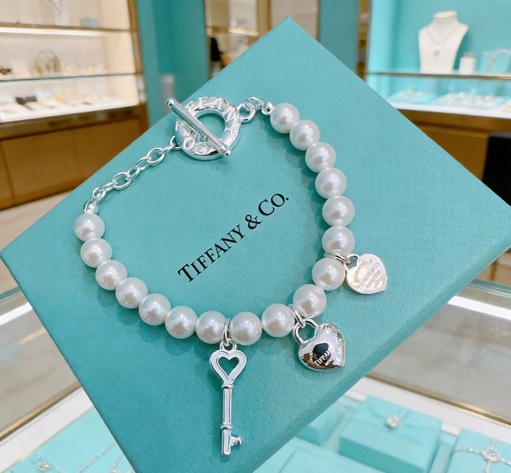 Tiffany & Co. Star and Charm Bead Bracelet - album image 3