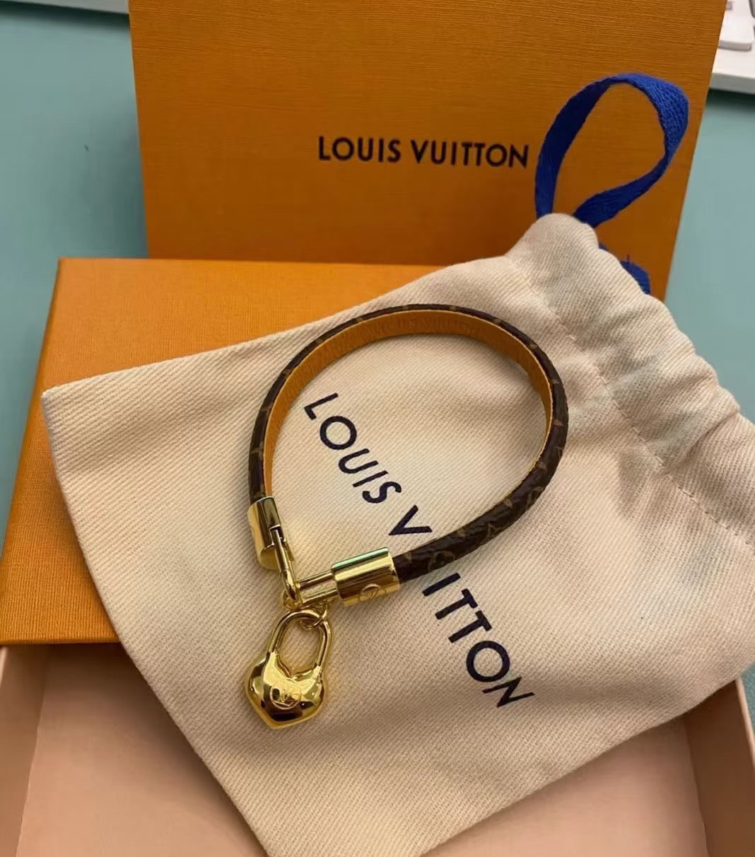 Louis Vuitton Circle Gold-Tone Leather Bracelet - album image 4