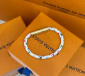 Louis Vuitton Circle Gold-Tone Leather Bangle - album image 1