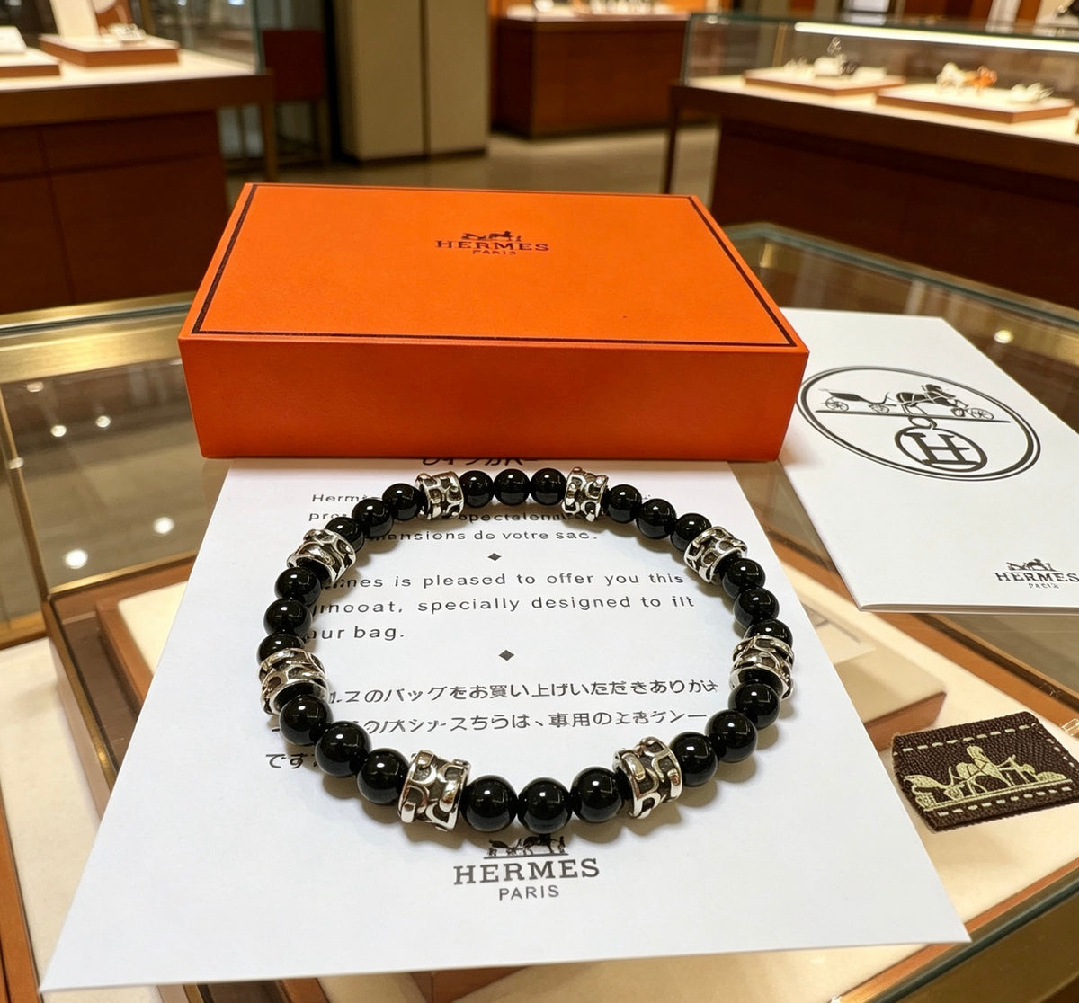 Hermès Black Bead Gold-Tone Anchor Charm Bracelet - album image 2