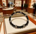 Hermès Black Bead Gold-Tone Anchor Charm Bracelet - album image 1