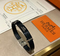 Hermès Black Leather Silver-Tone Bar Bracelet - album image 1