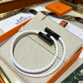 Hermès White Leather Black H Bracelet - album image 1