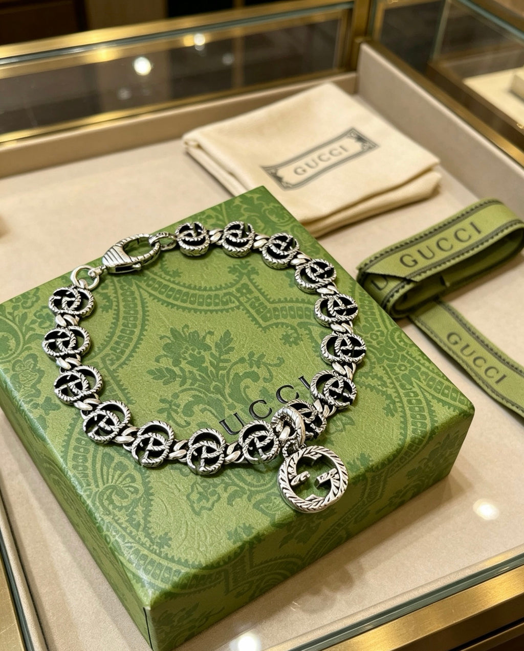 Gucci Silver-Tone GG Link Bracelet with G Charm - album image 5