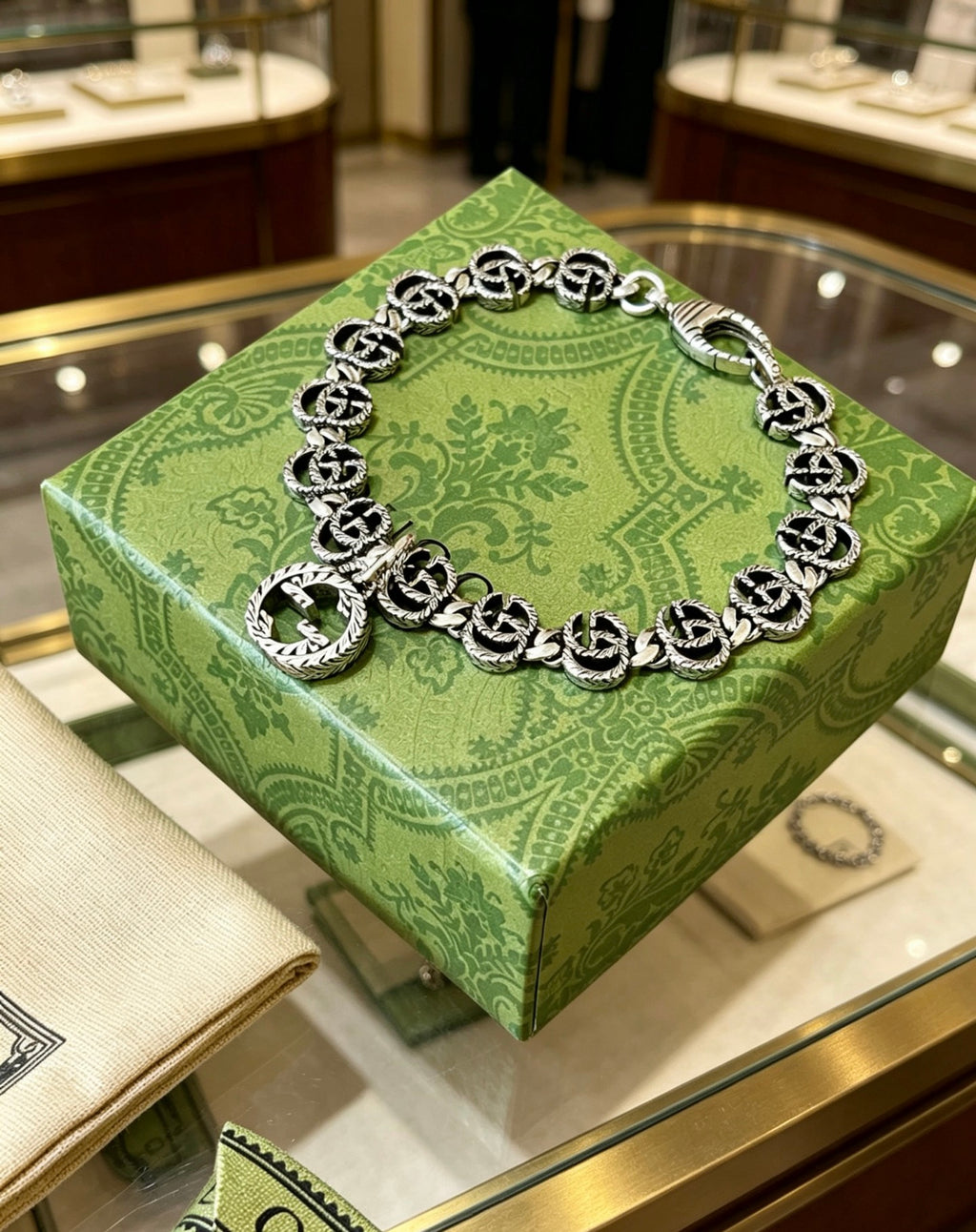 Gucci Silver-Tone GG Link Bracelet with G Charm - album image 6