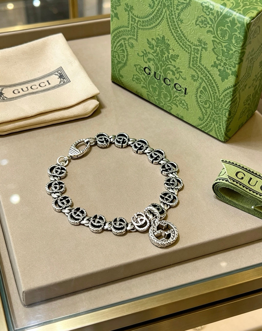 Gucci Silver-Tone GG Link Bracelet with G Charm - album image 2