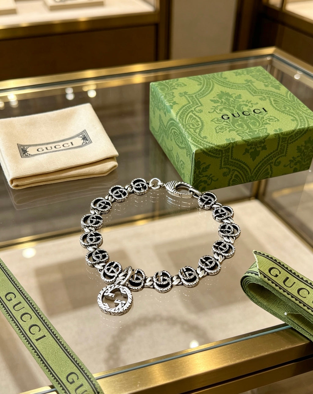 Gucci Silver-Tone GG Link Bracelet with G Charm - album image 8