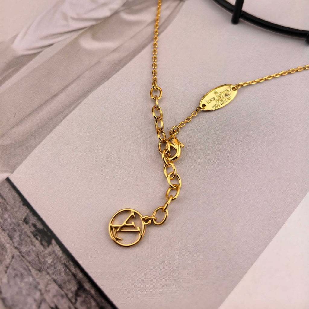 Louis Vuitton Gold-Tone Circular Pendant Necklace - album image 9