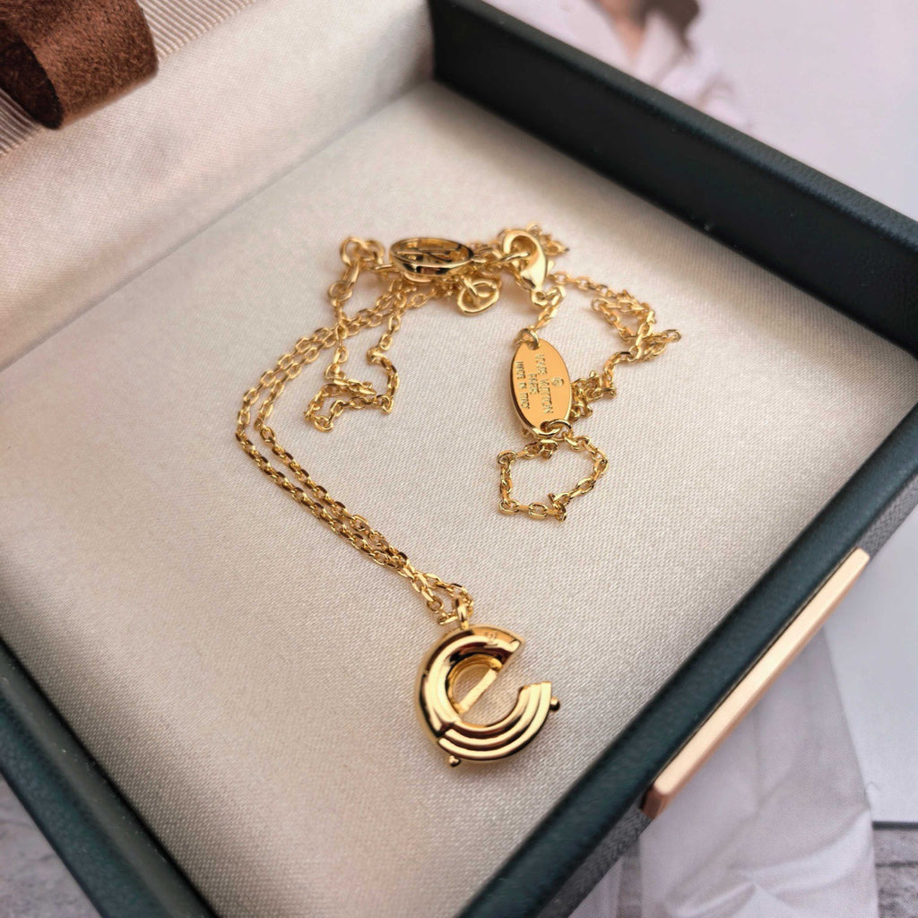 Louis Vuitton Gold-Tone Circular Pendant Necklace - album image 5