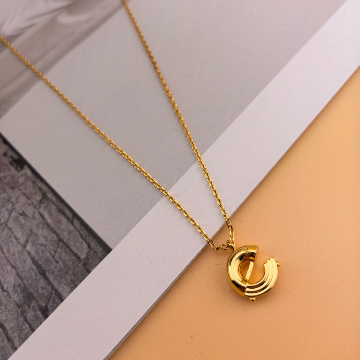 Louis Vuitton Gold-Tone Circular Pendant Necklace - album image 3
