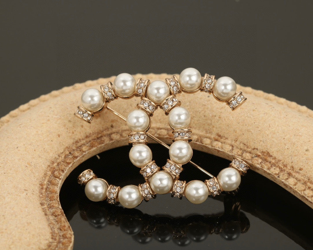 Chanel Interlocking C Brooch - album image 1